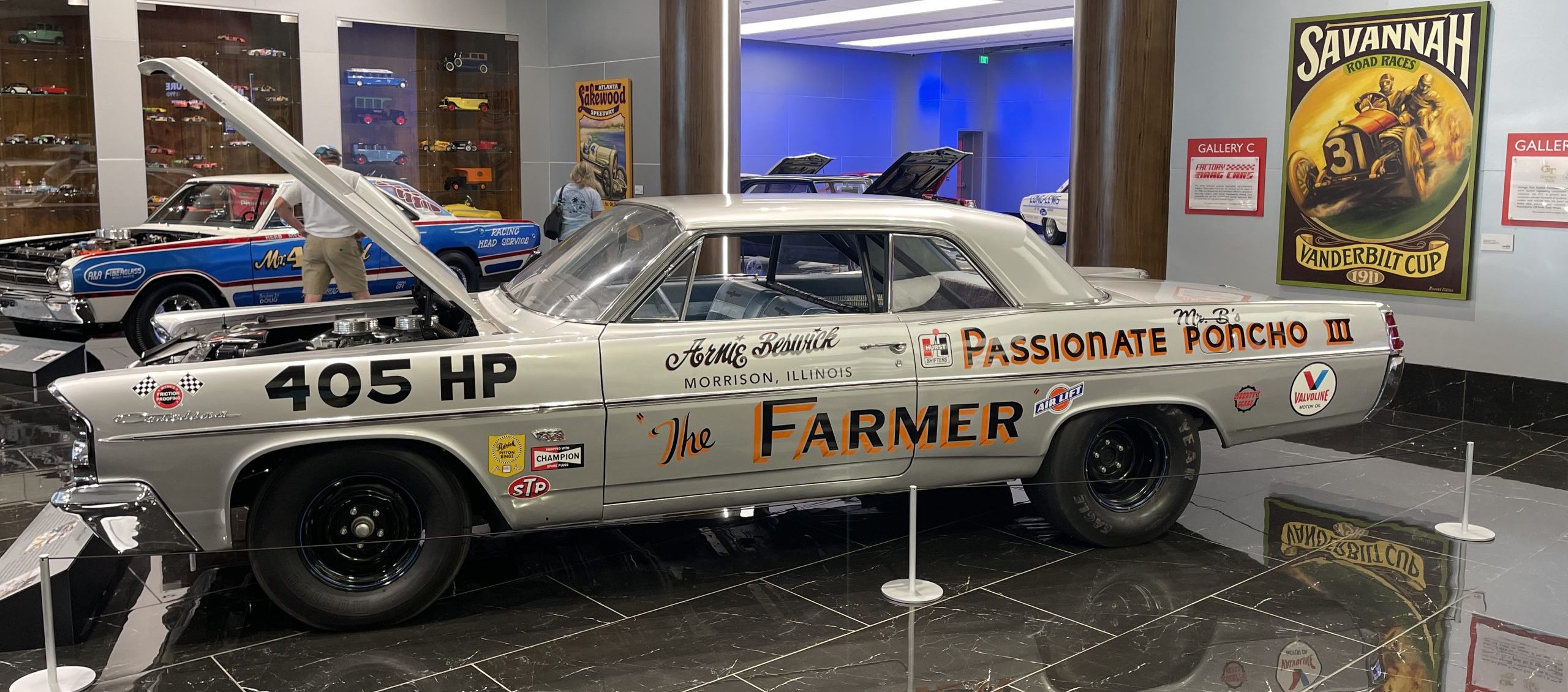 Vintage silver car with decal stickers placed all over it